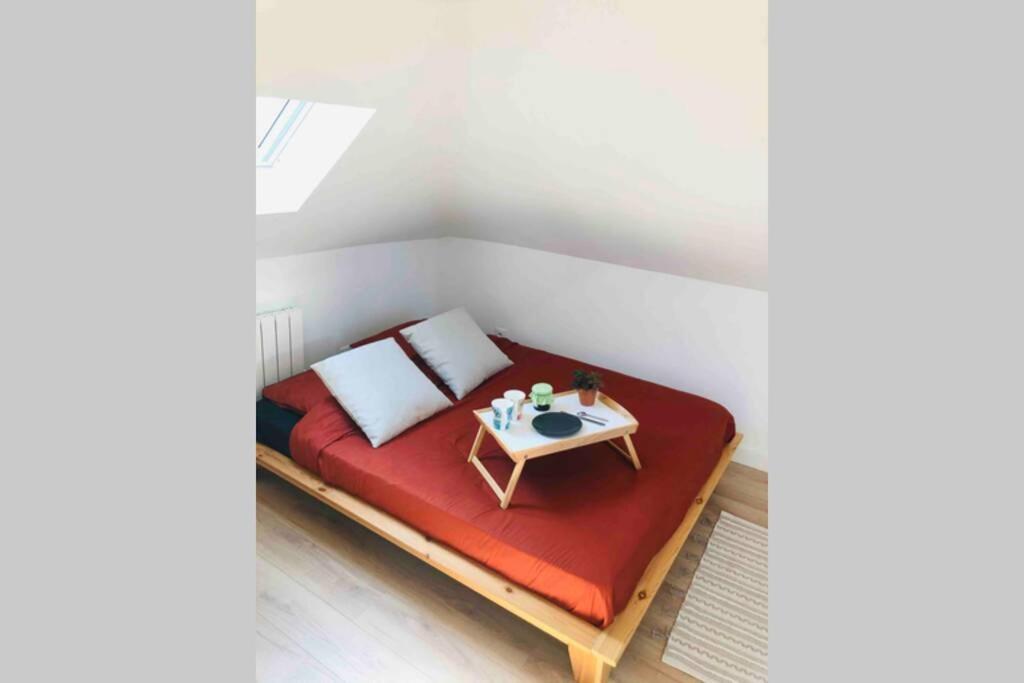 Sous Les Nuages Apartment รูออง ภายนอก รูปภาพ